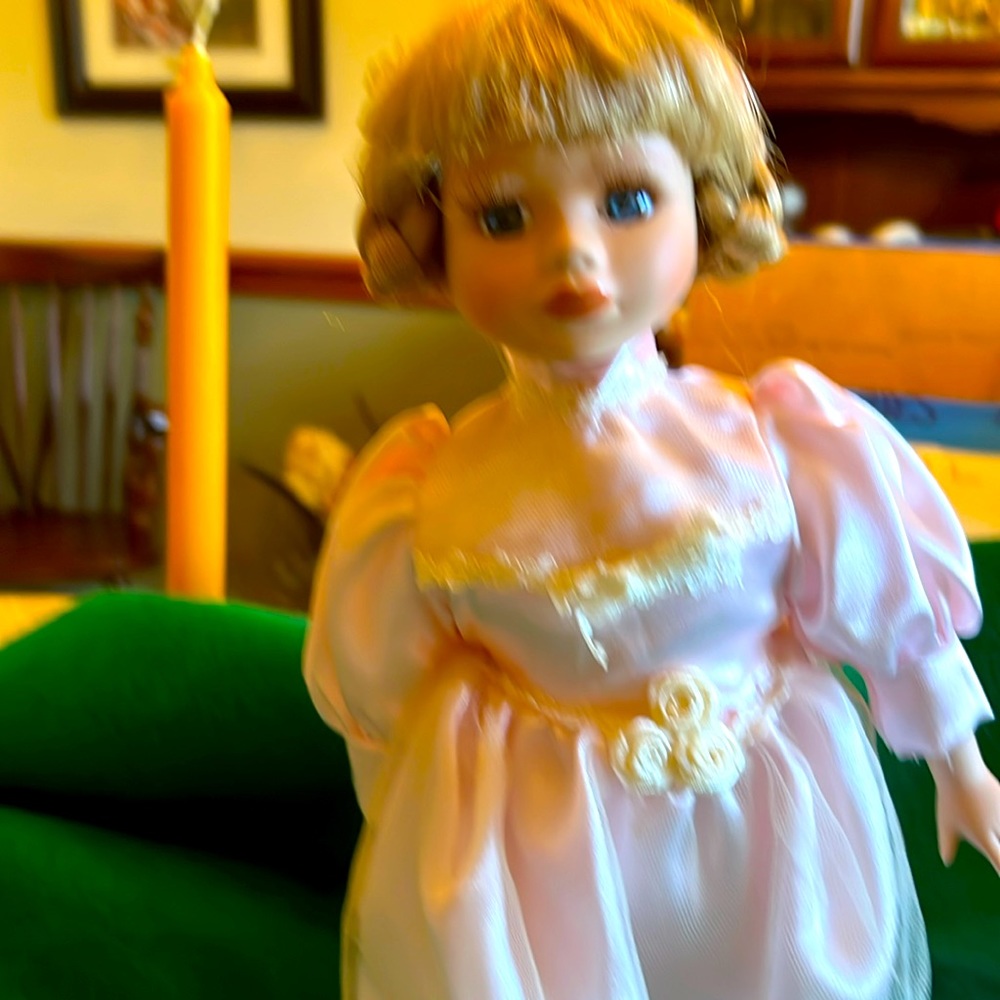 Vintage porcelain doll with pink dress and blonde braided hair 13 inches